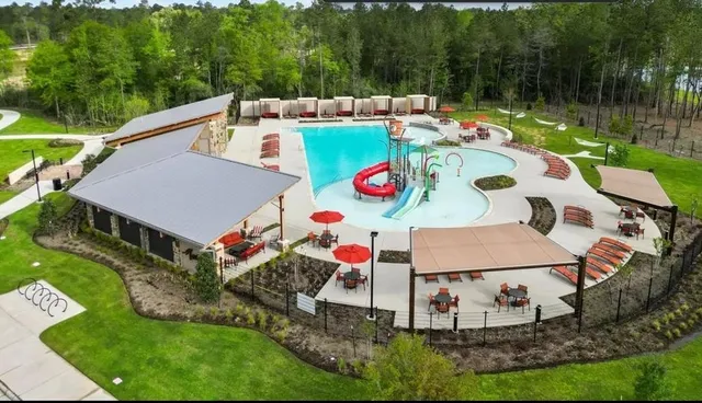a play ground with a table and chairs