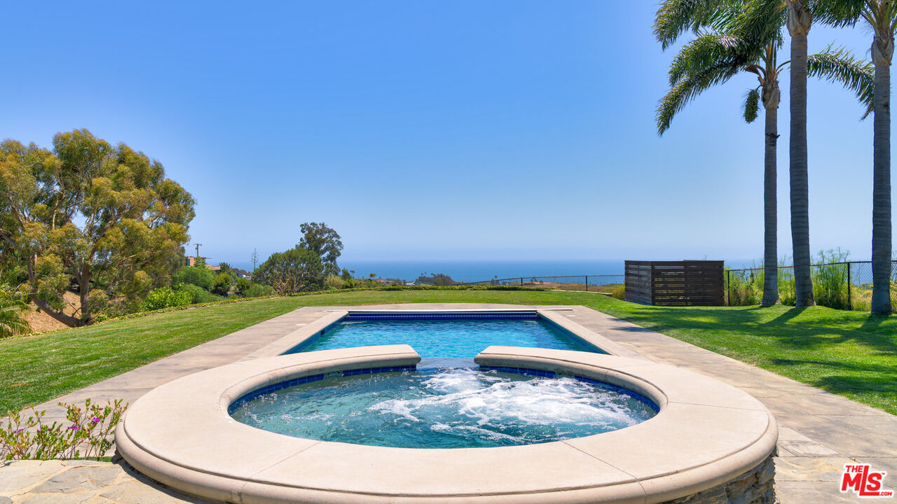 29660 Harvester Road Malibu, CA 90265 - Photo 22 of 45 a view of swimming pool with a yard