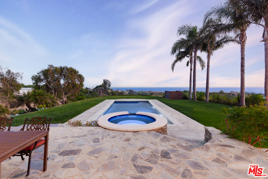 29660 Harvester Road Malibu, CA 90265 - Photo 38 of 45 a view of swimming pool with a yard