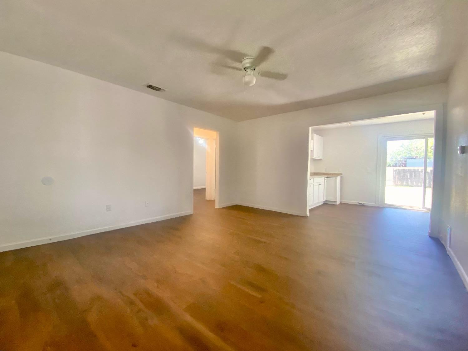 517 54th Street Lubbock, TX 79404 - Photo 5 of 16 a view of an empty room with a window