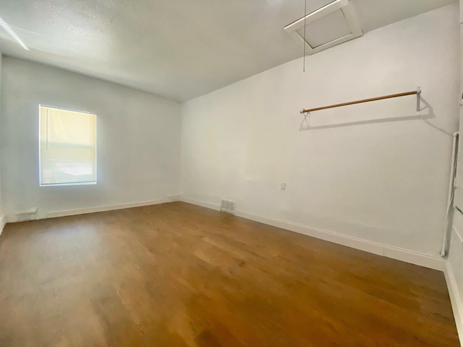 517 54th Street Lubbock, TX 79404 - Photo 9 of 16 an empty room with a window