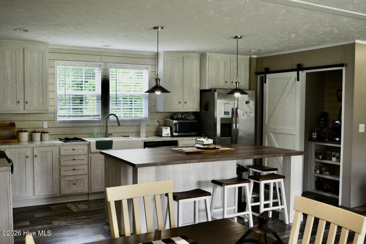 1430 Nixonton Road Elizabeth City, NC 27909 - Photo 13 of 30 Nice overhead lighting in the kitchen to keep everything well lit and bright.