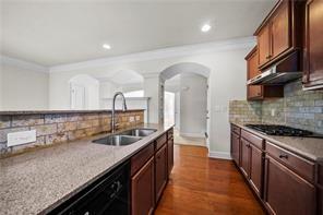 2829 Seneca Creek Lane, Unit 3 Marietta, GA 30067 - Photo 12 of 23 a kitchen with granite countertop a sink and cabinets