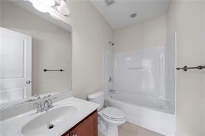 2829 Seneca Creek Lane, Unit 3 Marietta, GA 30067 - Photo 15 of 23 a bathroom with a sink a toilet and shower