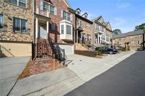 2829 Seneca Creek Lane, Unit 3 Marietta, GA 30067 - Photo 2 of 23 a view of a street with buildings