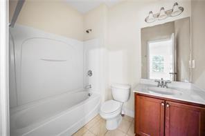 2829 Seneca Creek Lane, Unit 3 Marietta, GA 30067 - Photo 21 of 23 a bathroom with a sink a toilet and bathtub