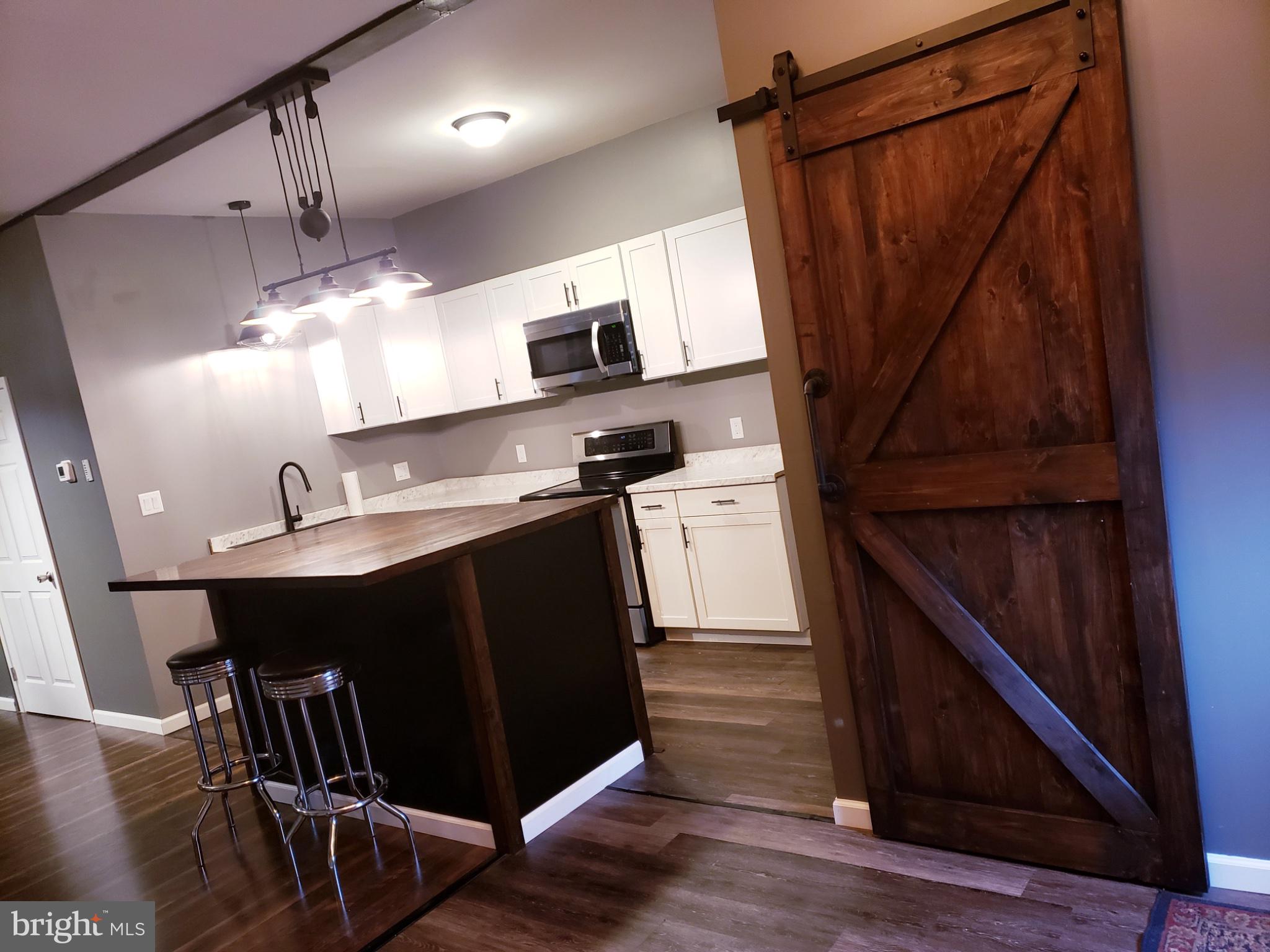 12419 Vale Summit Road Southwest Frostburg, MD 21532 - Photo 25 of 39 Charming kitchen with rustic accents.