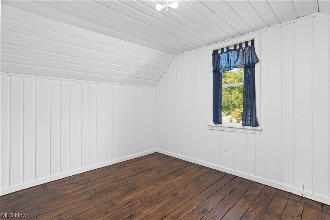 27122 Cook Road Olmsted Falls, OH 44138 - Photo 23 of 34 Additional living space featuring hardwood flooring and lofted ceiling