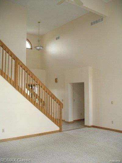 7580 Dell Road Saline, MI 48176 - Photo 2 of 17 CERAMIC FOYER & OAK STAIRS