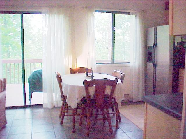 42 Cherry Ridge Road Bushkill, PA 18324 - Photo 8 of 8 a view of a dining room with furniture and a window