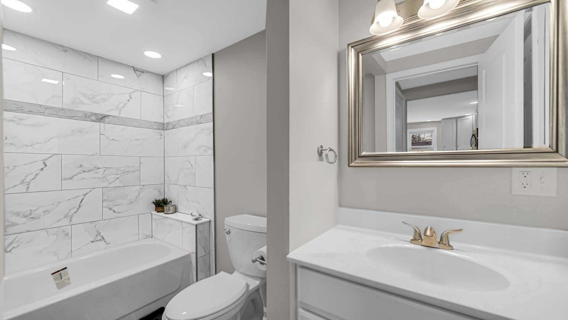 337 North Dearborn Street Hobart, IN 46342 - Photo 10 of 19 a bathroom with a sink toilet and shower