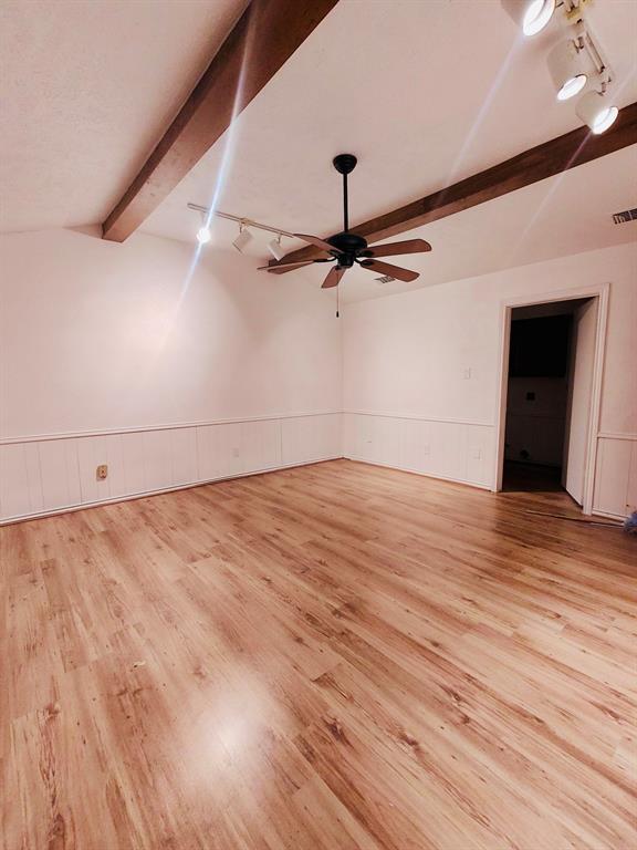 2012 Cross Bend Road Plano, TX 75023 - Photo 4 of 11 a view of a room with wooden floor