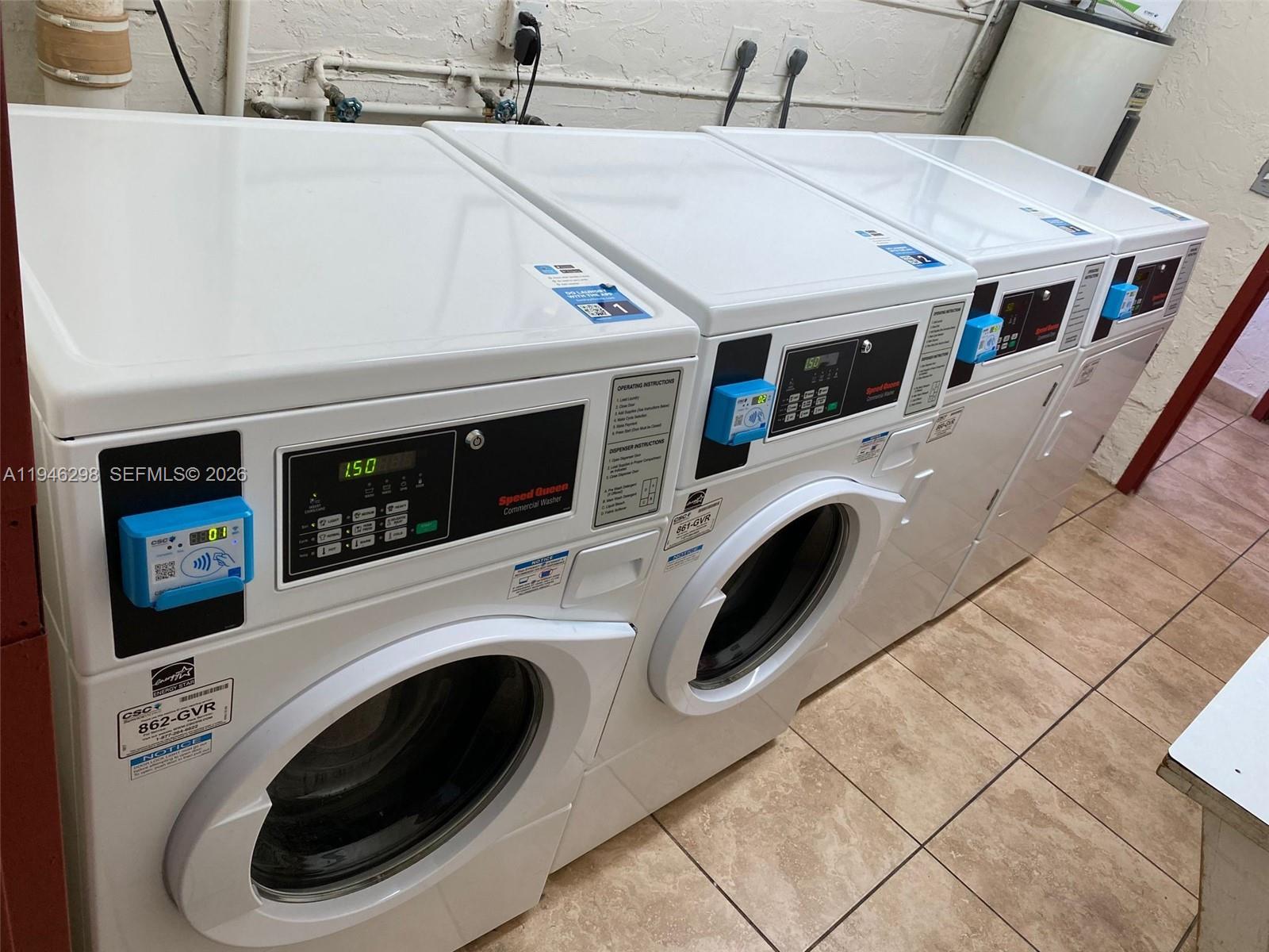 4805 Northwest 7th Street, Unit 10315 Miami, FL 33126 - Photo 19 of 22 a utility room with dryer and washer