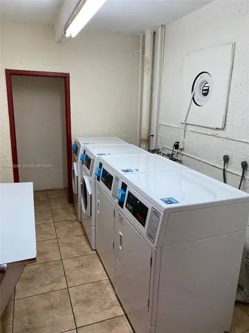a utility room with washer and dryer