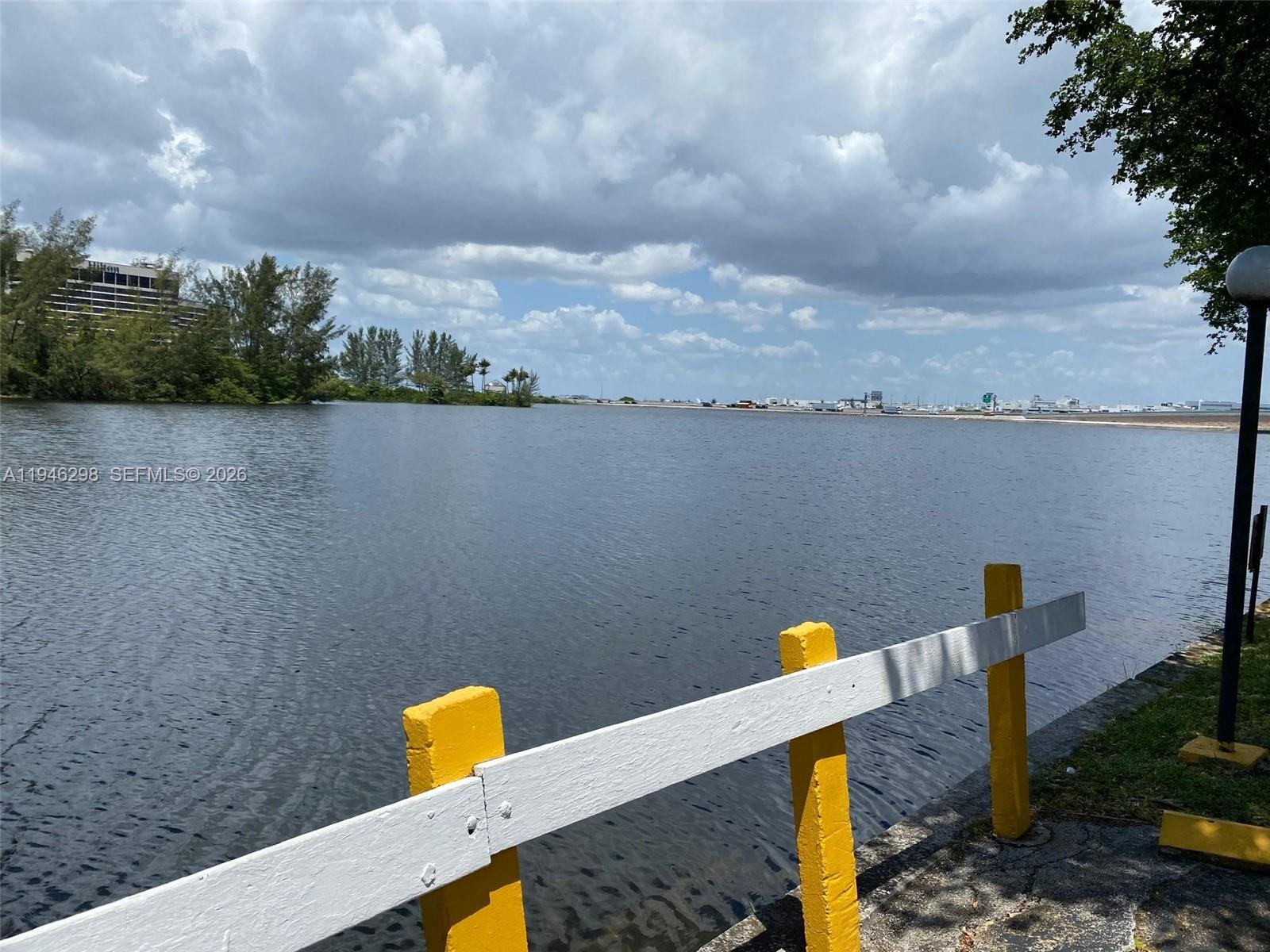 4805 Northwest 7th Street, Unit 10315 Miami, FL 33126 - Photo 21 of 22 a view of a lake and mountain view
