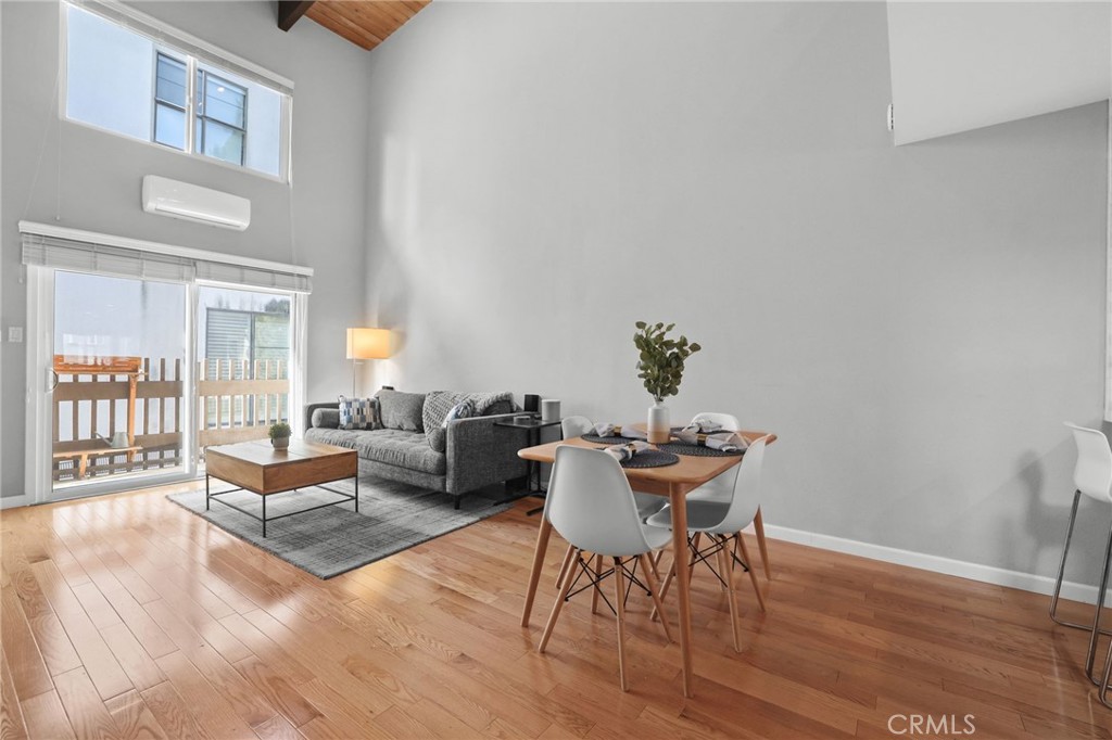 11954 Goshen Avenue, Unit 205 Los Angeles, CA 90049 - Photo 18 of 48 a living room with furniture and a wooden floor