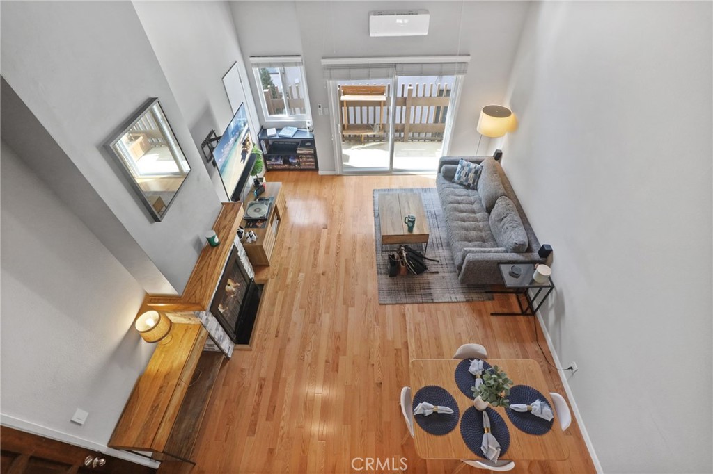 11954 Goshen Avenue, Unit 205 Los Angeles, CA 90049 - Photo 30 of 48 a view of a livingroom with furniture wooden floor and windows