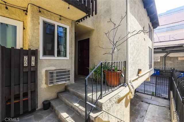 a view of balcony with furniture