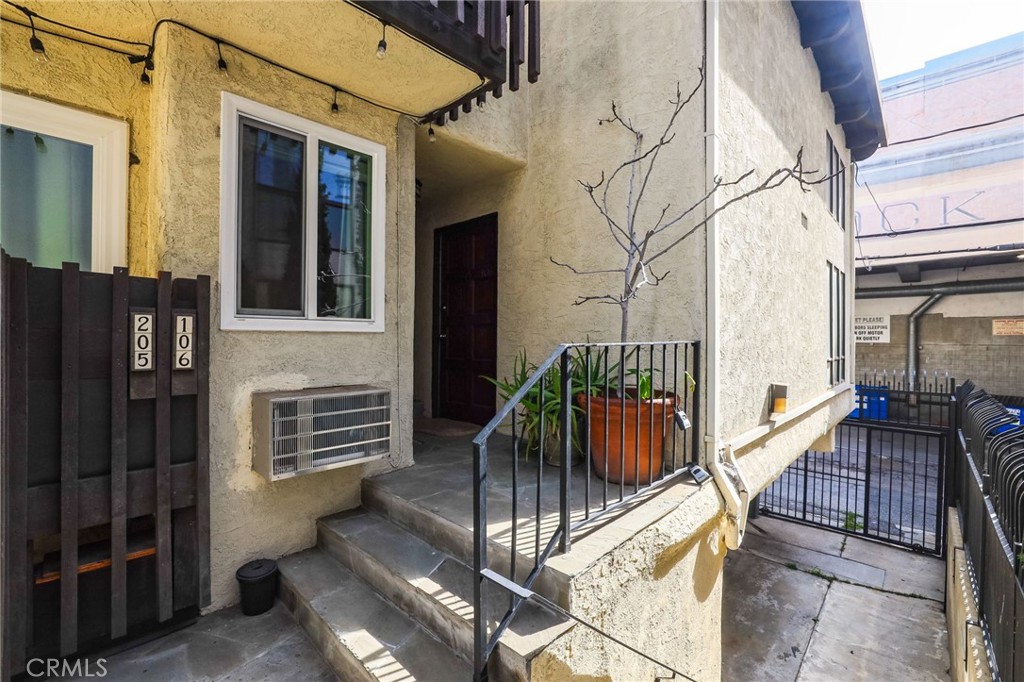 11954 Goshen Avenue, Unit 205 Los Angeles, CA 90049 - Photo 6 of 48 a view of balcony with furniture