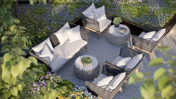 a view of a chairs and table in a backyard