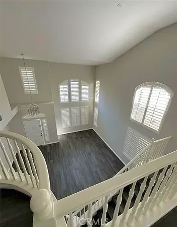 view of an empty room with wooden floor