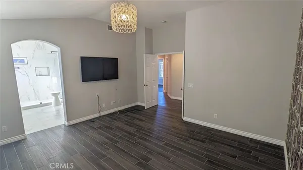 a view of a livingroom with wooden floor