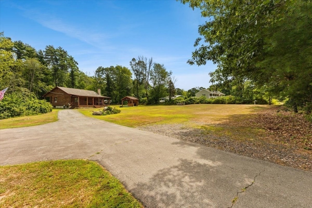 148 Braley Hill Road Rochester, MA 02770 - Photo 2 of 41 a view of a swimming pool and an outdoor space