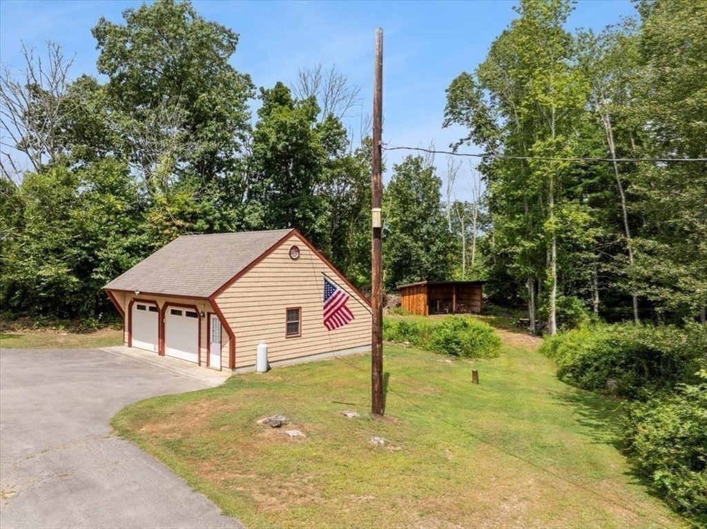 148 Braley Hill Road Rochester, MA 02770 - Photo 32 of 41 a view of a house with pool