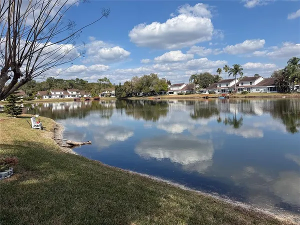 a view of a lake in between the city