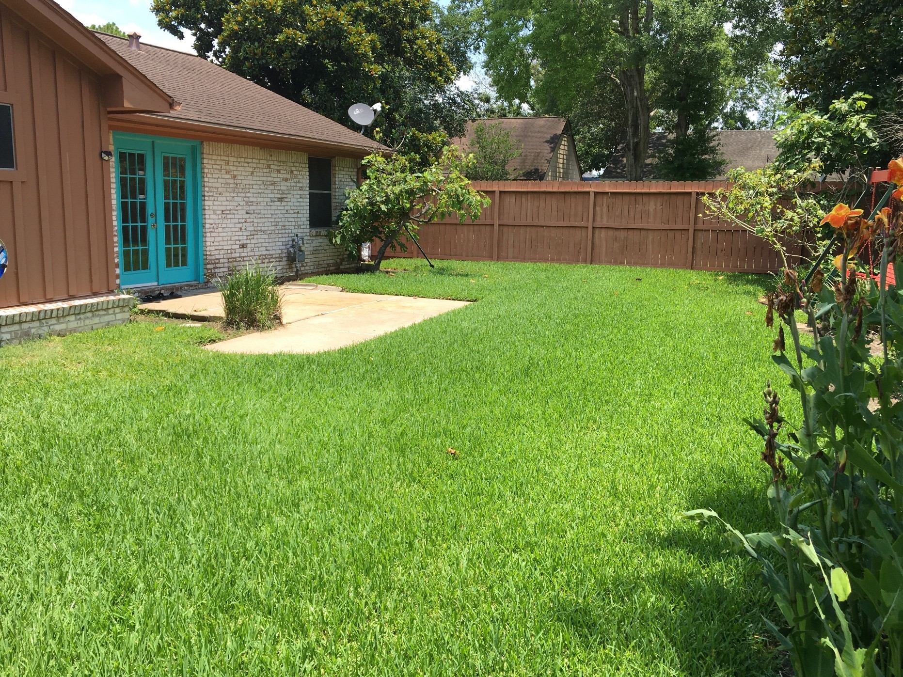 9307 Val Verde Street Houston, TX 77063 - Photo 16 of 17 a view of a house with a yard and sitting area