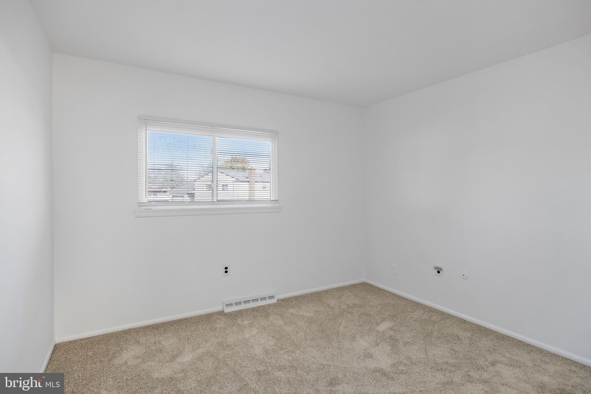 227 University Avenue Pemberton, NJ 08068 - Photo 12 of 33 an empty room with a window