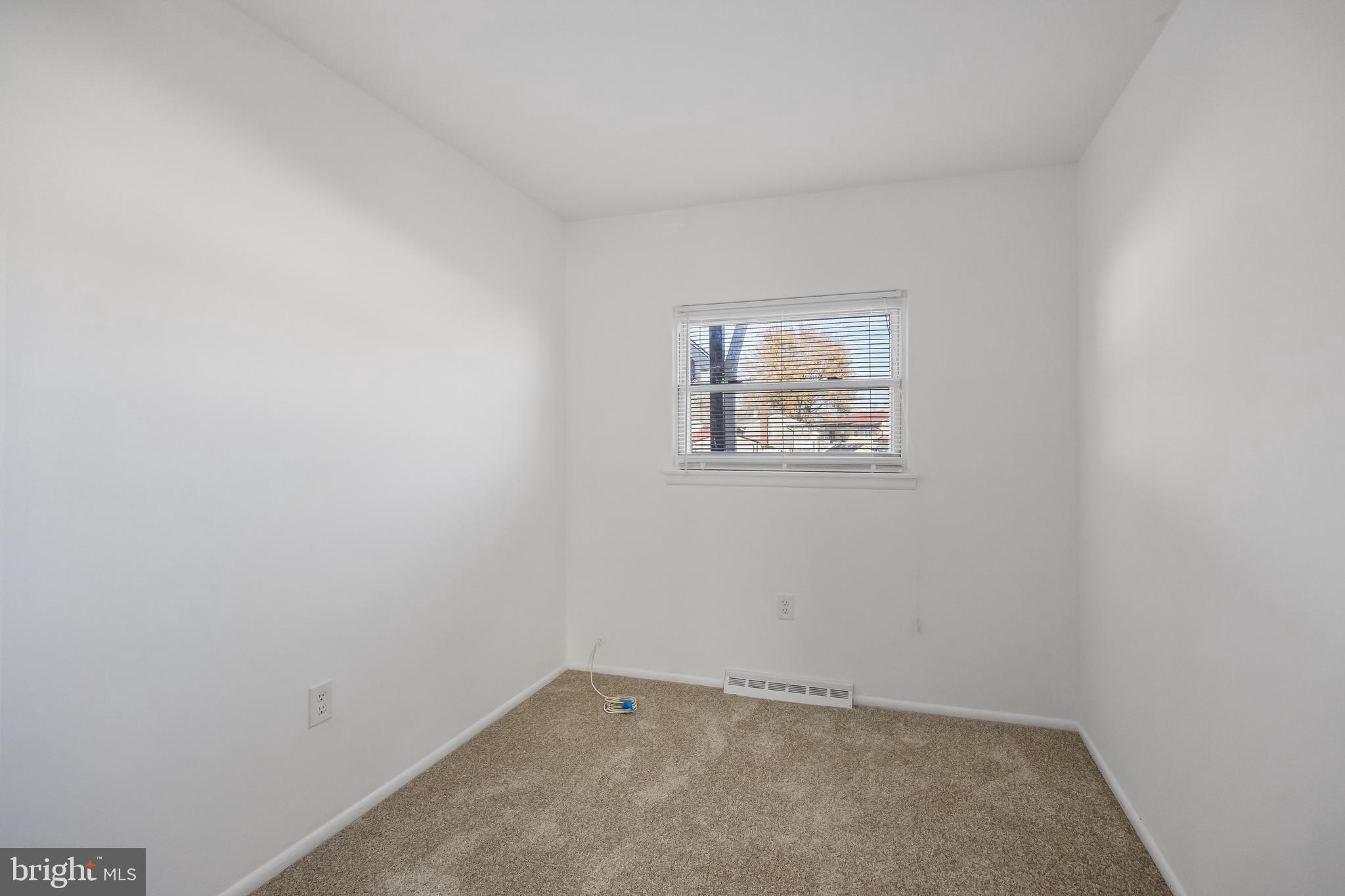 227 University Avenue Pemberton, NJ 08068 - Photo 16 of 33 an empty room with a window