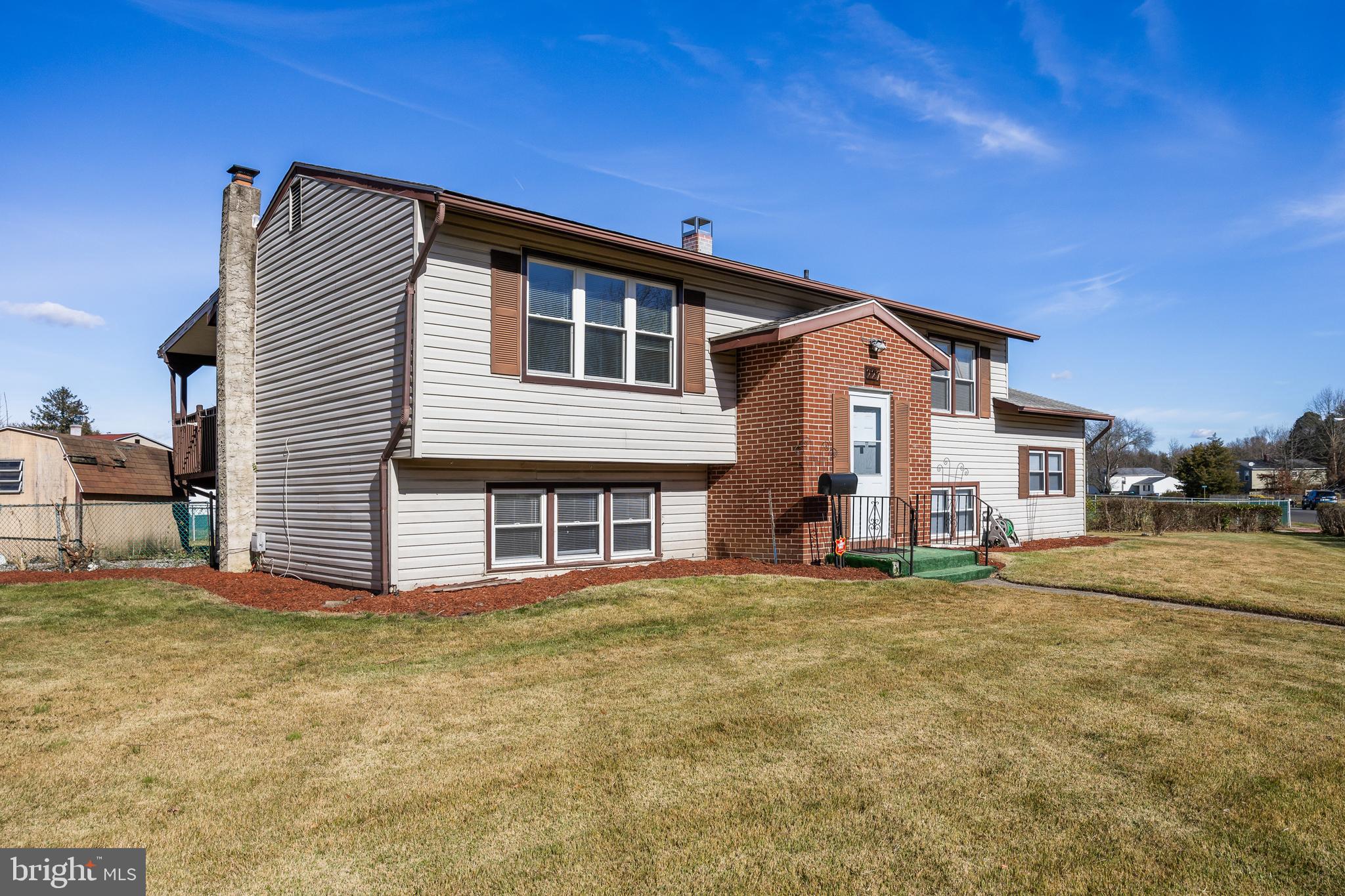 227 University Avenue Pemberton, NJ 08068 - Photo 2 of 33 a front view of a house with a yard
