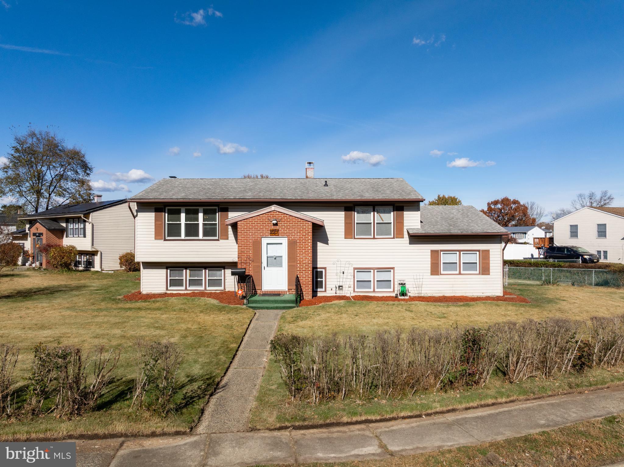 227 University Avenue Pemberton, NJ 08068 - Photo 26 of 33 a front view of a house with a yard
