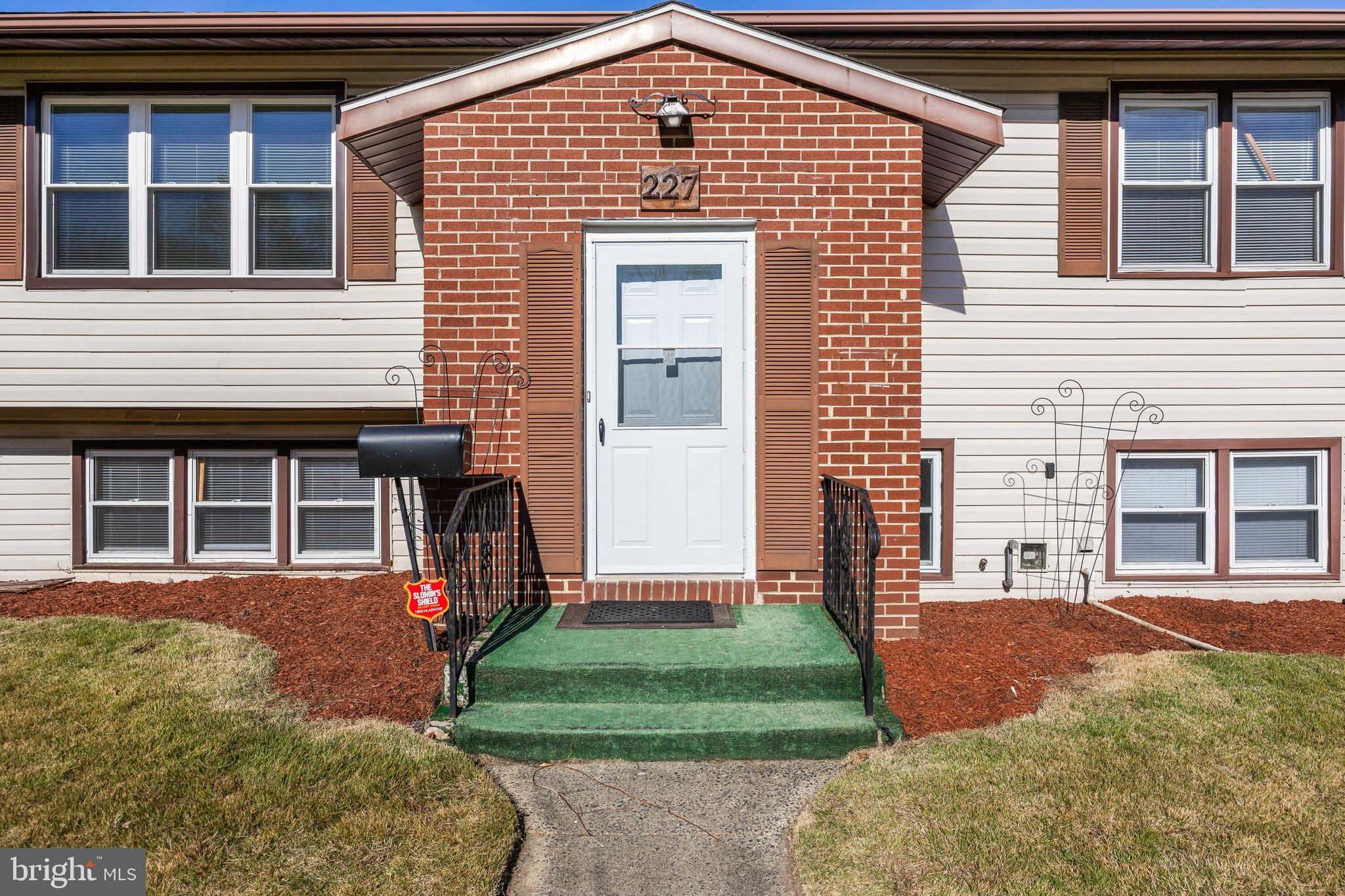 227 University Avenue Pemberton, NJ 08068 - Photo 3 of 33 a front view of a house with garden