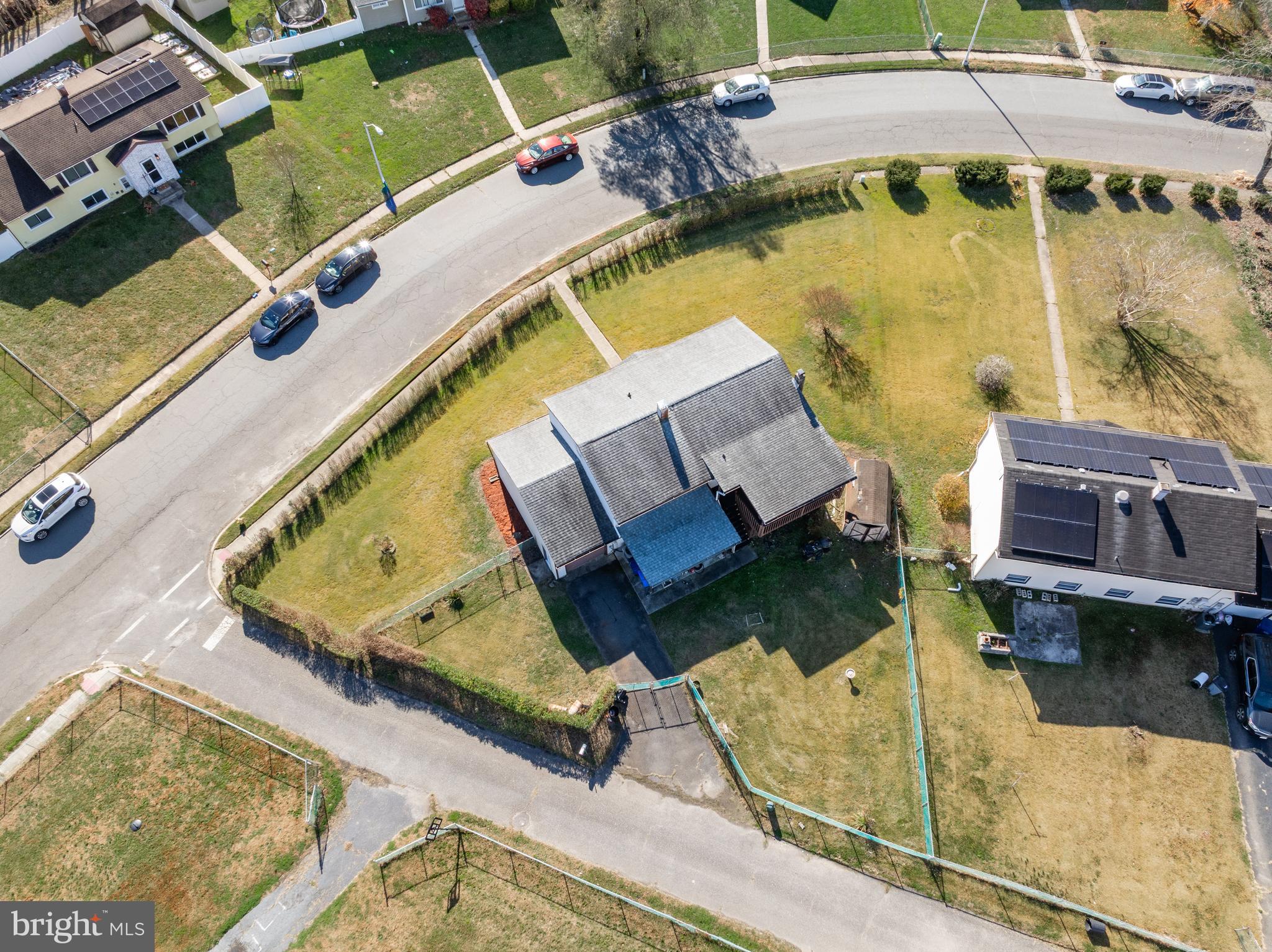 227 University Avenue Pemberton, NJ 08068 - Photo 32 of 33 an aerial view of a house with a swimming pool