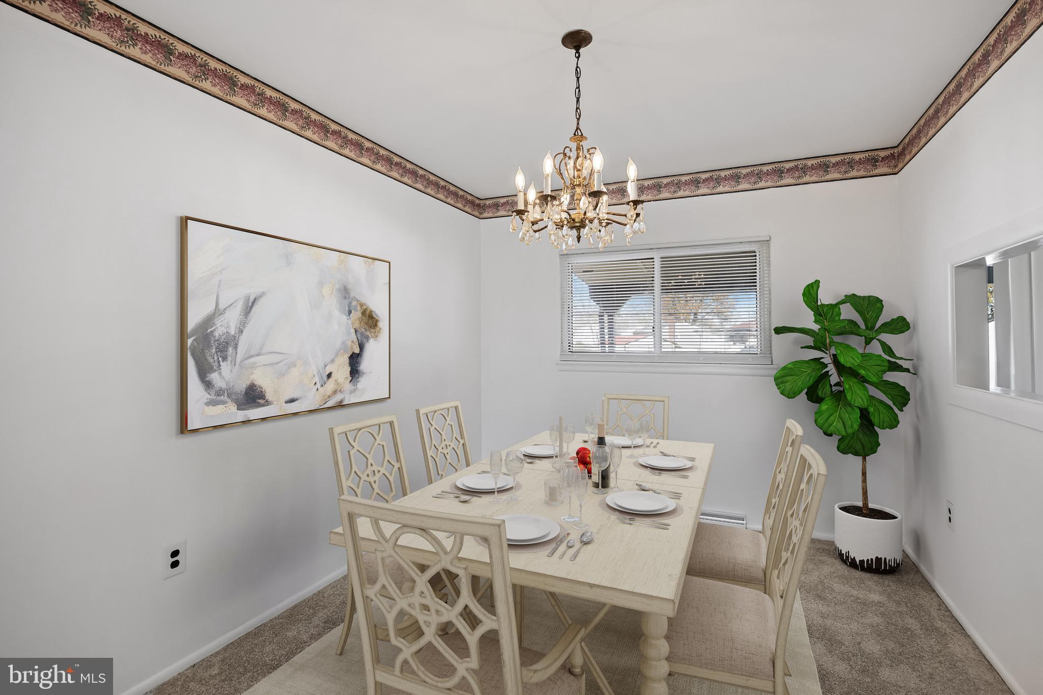 227 University Avenue Pemberton, NJ 08068 - Photo 5 of 33 a view of a dining room with furniture and chandelier