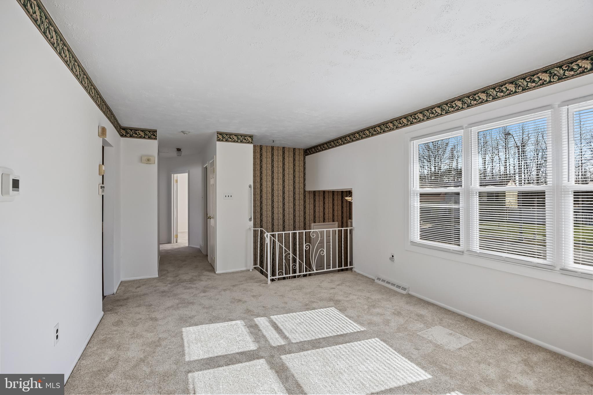227 University Avenue Pemberton, NJ 08068 - Photo 7 of 33 a view of an empty room with a window