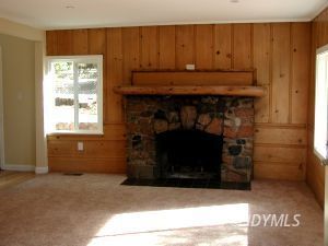 26831 Saunders Meadow Road Idyllwild, CA 92549 - Photo 2 of 8 a room with fireplace and a window