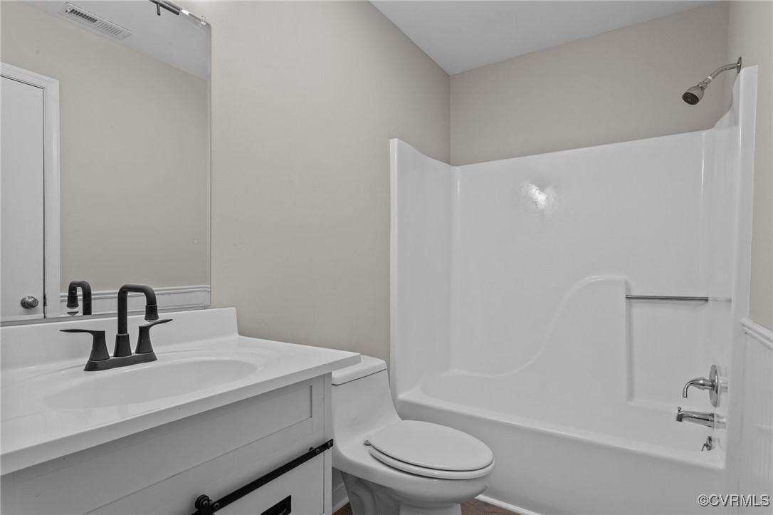 5237 Hallmark Drive Richmond, VA 23234 - Photo 12 of 44 a bathroom with a sink a toilet and shower