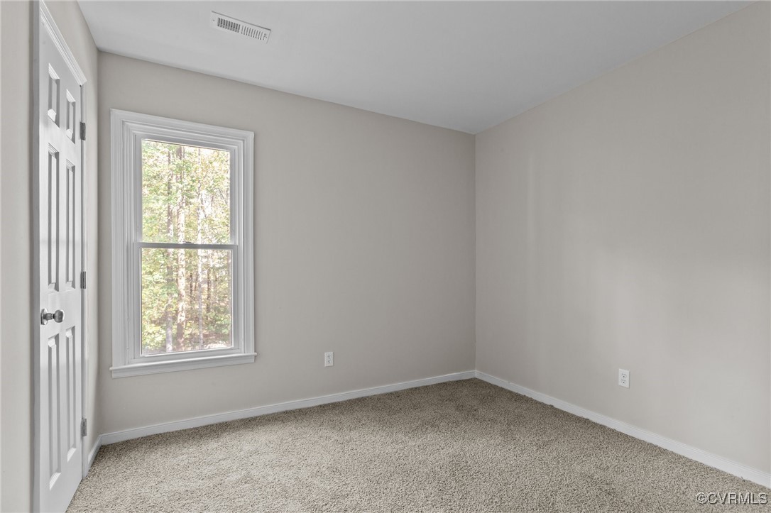 5237 Hallmark Drive Richmond, VA 23234 - Photo 15 of 44 an empty room with a window