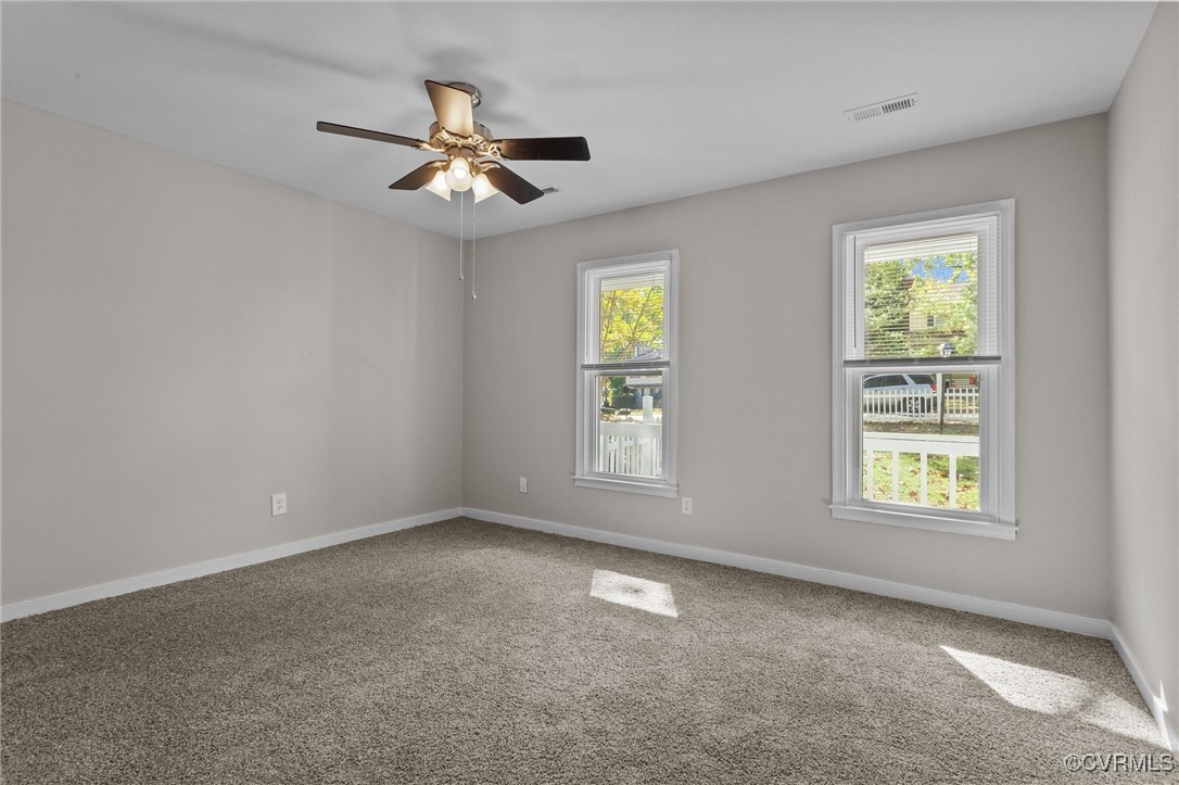 5237 Hallmark Drive Richmond, VA 23234 - Photo 16 of 44 a view of an empty room with a window