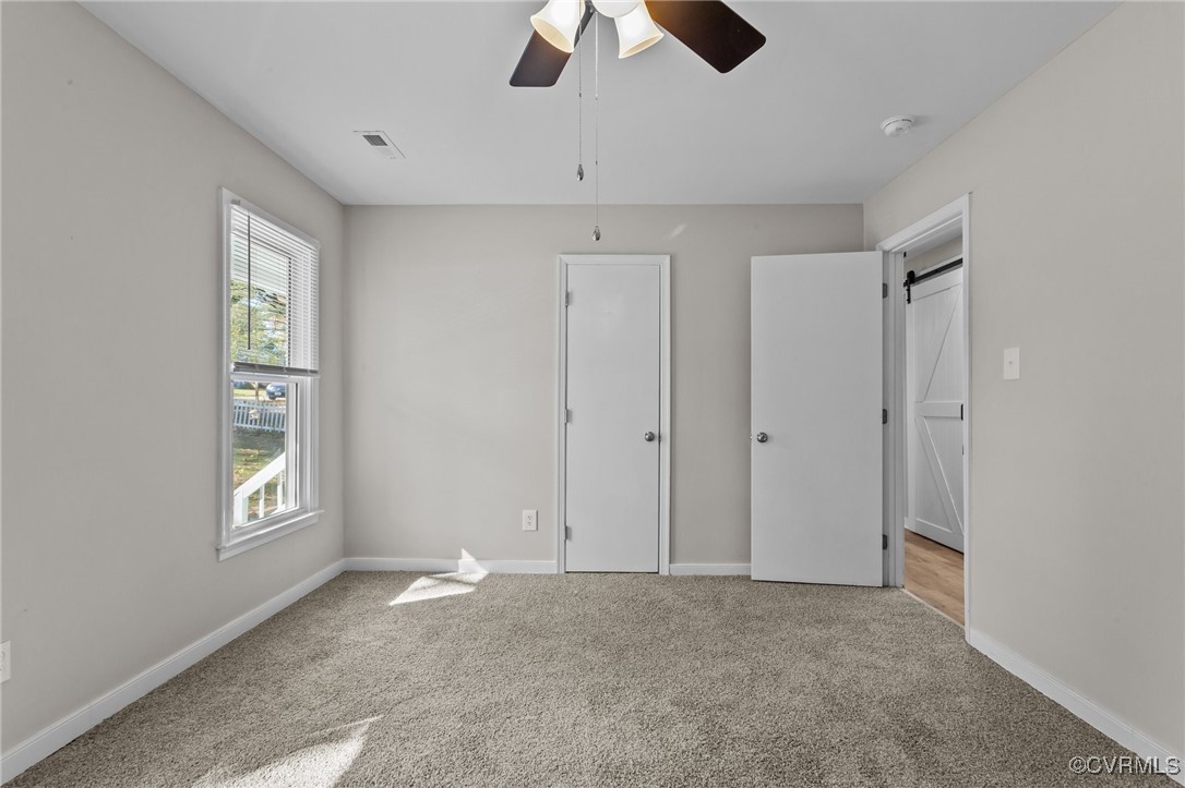 5237 Hallmark Drive Richmond, VA 23234 - Photo 17 of 44 a view of an empty room with a window