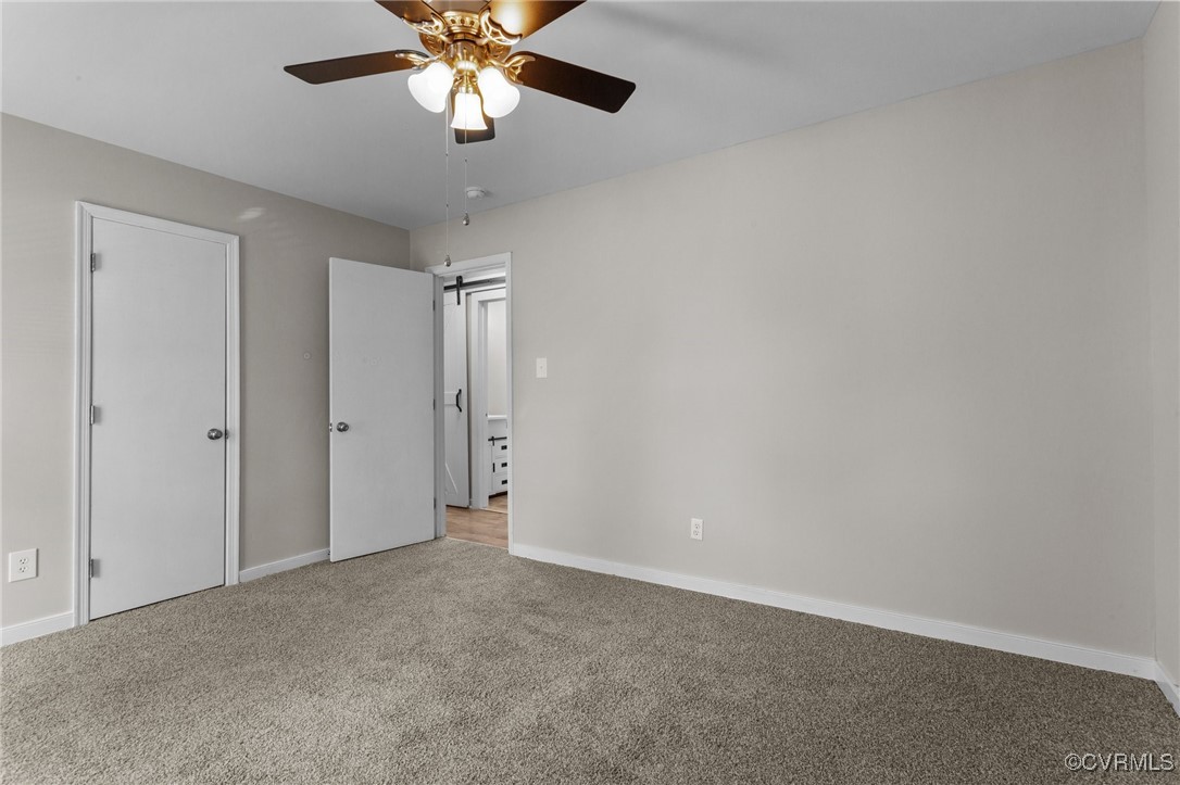 5237 Hallmark Drive Richmond, VA 23234 - Photo 18 of 44 a view of an empty room and chandelier fan