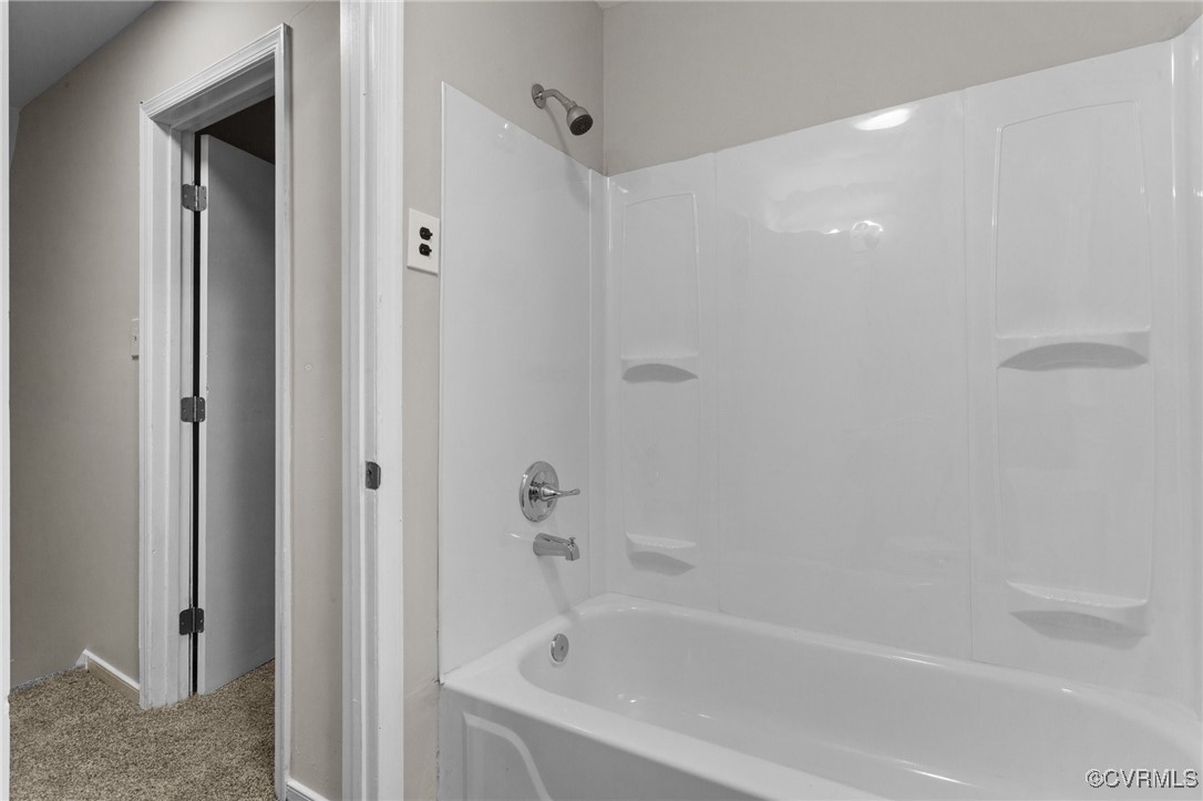 5237 Hallmark Drive Richmond, VA 23234 - Photo 21 of 44 a bathroom with a bathtub