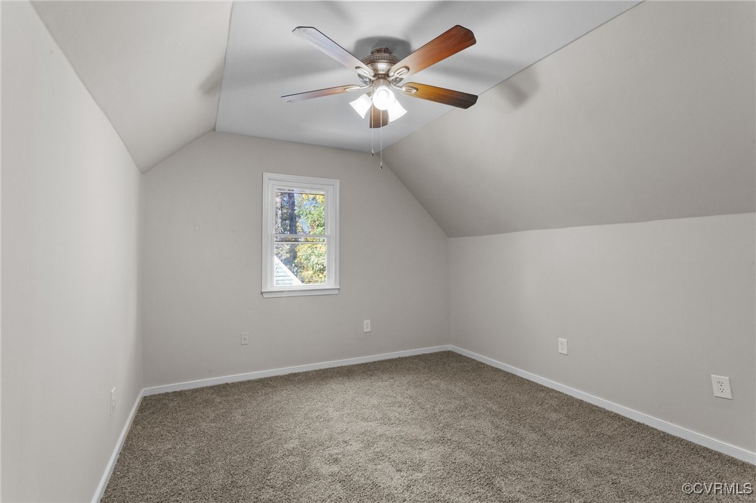 5237 Hallmark Drive Richmond, VA 23234 - Photo 25 of 44 an empty room with a ceiling fan and window