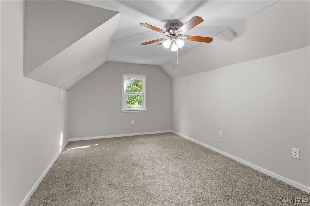5237 Hallmark Drive Richmond, VA 23234 - Photo 27 of 44 an empty room with a window and a fan