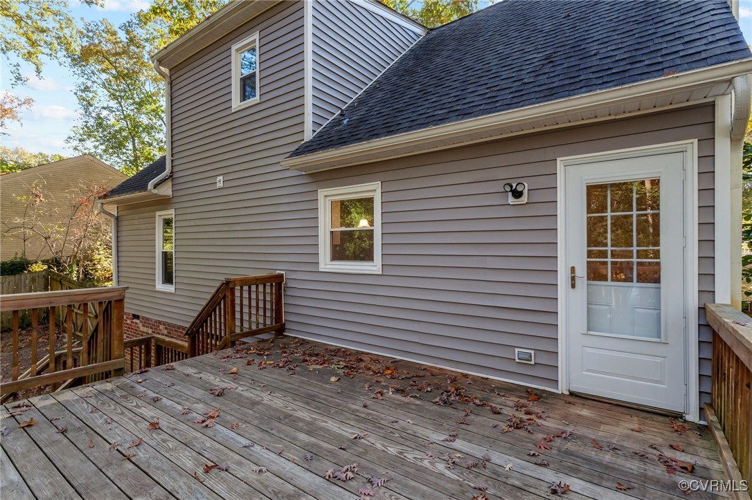 5237 Hallmark Drive Richmond, VA 23234 - Photo 33 of 44 a view of a house with a wooden deck and furniture