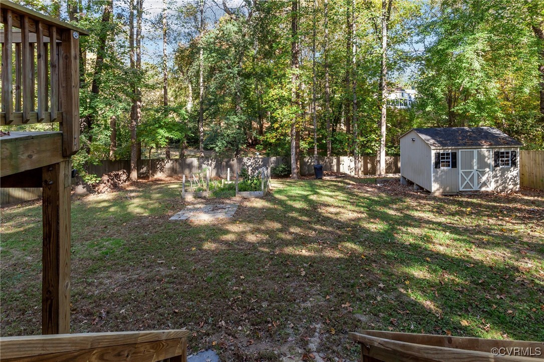 5237 Hallmark Drive Richmond, VA 23234 - Photo 36 of 44 a backyard of a house with table and chairs