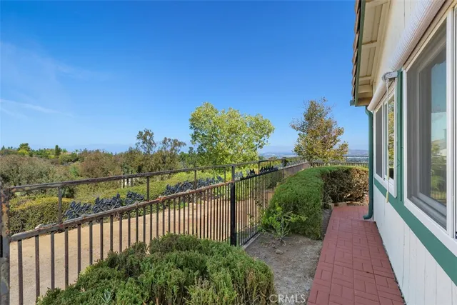 a view of a pathway with a balcony